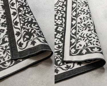Elle Decoration - Gemini Vendbart Inde/Ude Tæppe - 106024 Sort